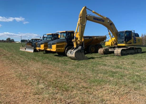 HGS Contracting equipment fleet staged on a project site